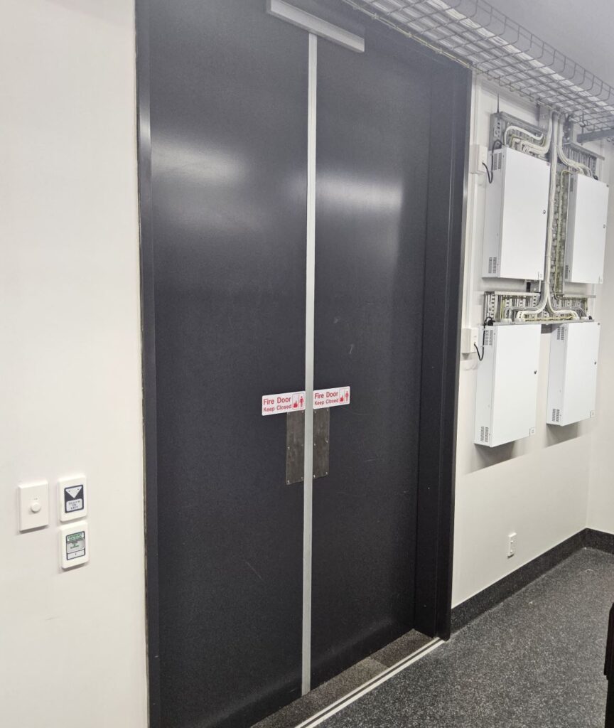 Access-controlled double doors