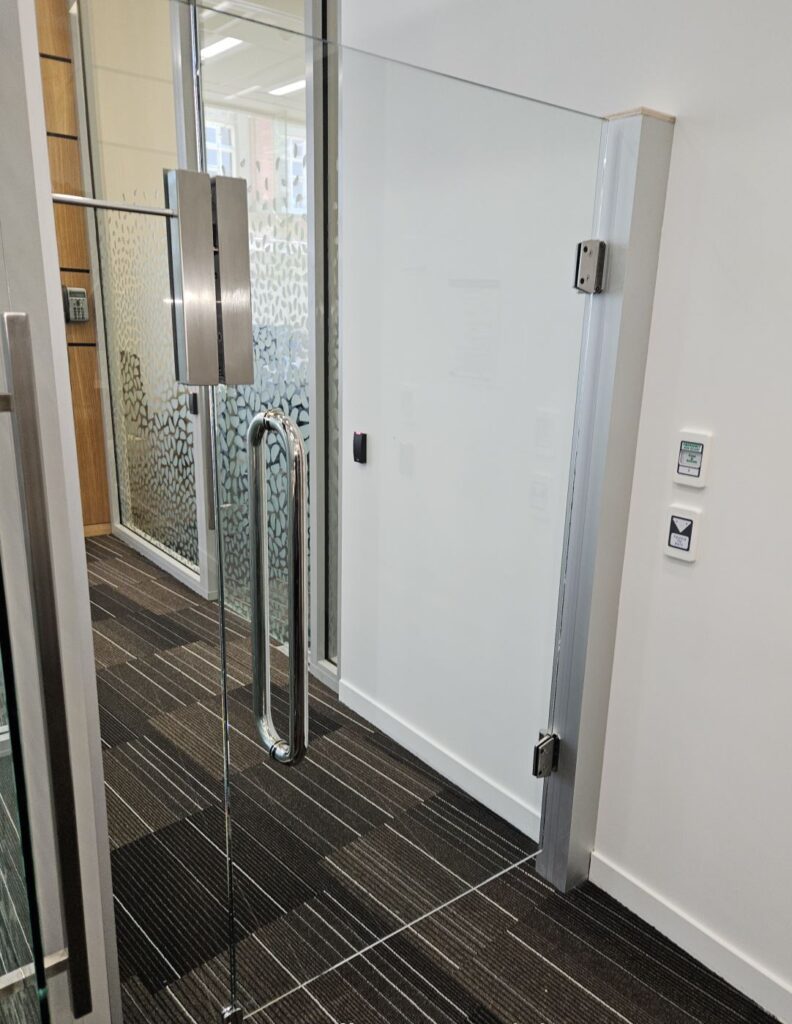 Glass door lock and reader